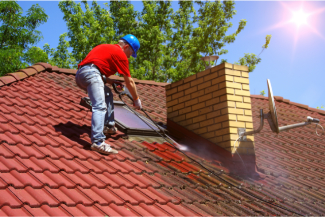 House roof cleaning with pressure tool